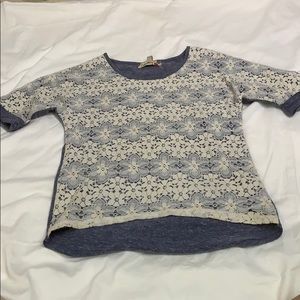 Short/long sleeve shirt and jean shorts.